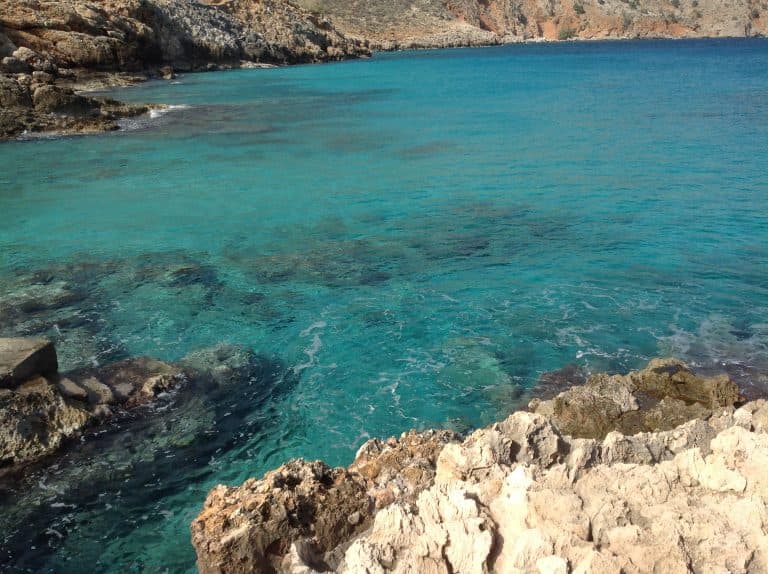 Crystal clear deep waters at Ombrosigialos snorkeling spot